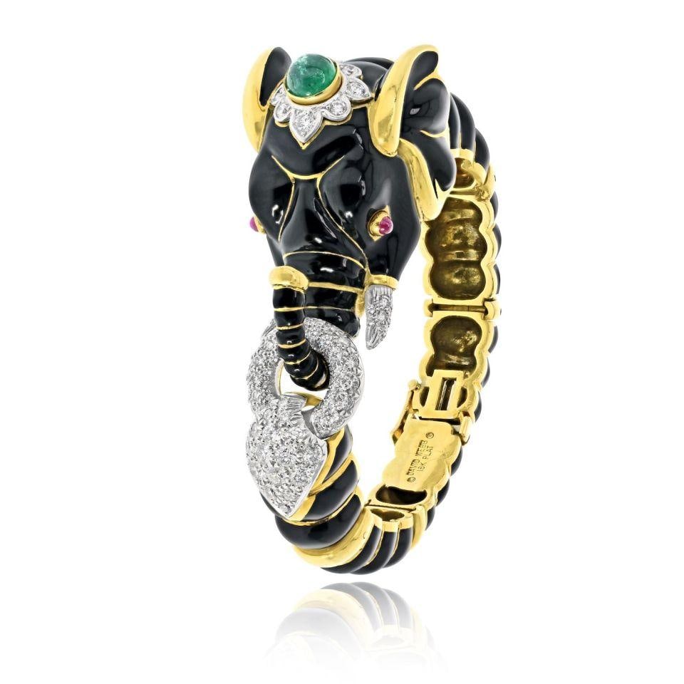 David Webb Elephant Bracelet in 18K Yellow Gold: David Webb Elephant Bracelet in 18K Yellow Gold Pre-owned David Webb bracelet featuring an elephant motif in 18K yellow gold. Specifications Brand: David Webb Item Type: Bracelet Motif: Elephant Metal