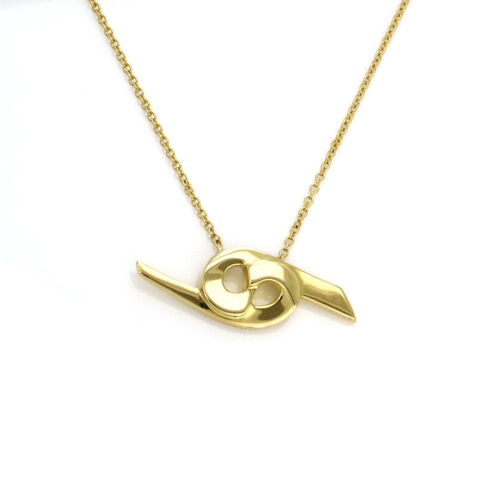Tiffany & Co. Paloma Picasso Cancer Zodiac Pendant 18k Gold Necklace: Tiffany & Co. Paloma Picasso Cancer Zodiac Pendant 18k Gold Necklace Discover the elegance of this authentic Tiffany & Co. necklace designed by Paloma Picasso. Crafted from luxurious 18k yellow gold w