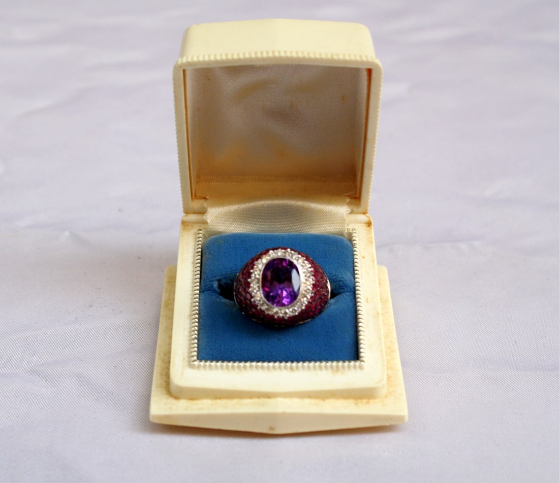 Magnificent French 14K White Gold Diamond Amethyst Ruby Ring with Box: Magnificent French 14K White Gold Diamond Amethyst Ruby Ring with Box Presenting a stunning French ring crafted in 14K white gold, adorned with exquisite diamonds, amethyst, and ruby. This elegant pie