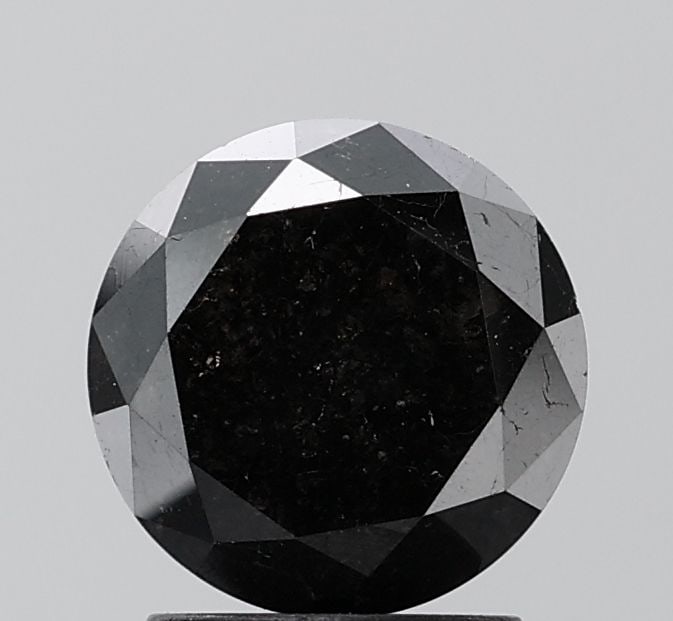 Loose Diamond - ROUND 2.33ct Fancy Black VS1: Loose Diamond - ROUND 2.33ct Fancy Black VS1 Source: Natural Shape: ROUND Carats: 2.33 Color: Fancy Black Certification: NONE Video: