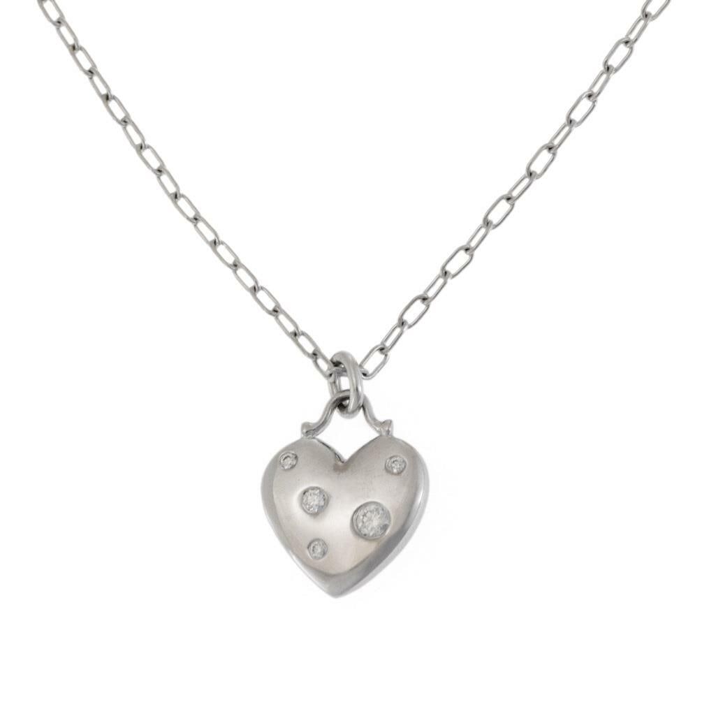 Tiffany Etoile diamond heart pendant 18k white gold 16 inch chain: Tiffany Etoile diamond heart pendant 18k white gold 16 inch chain This elegant necklace from the Tiffany & Co. Etoile Collection features a flat heart-shaped pendant crafted in 18k white gold with a h