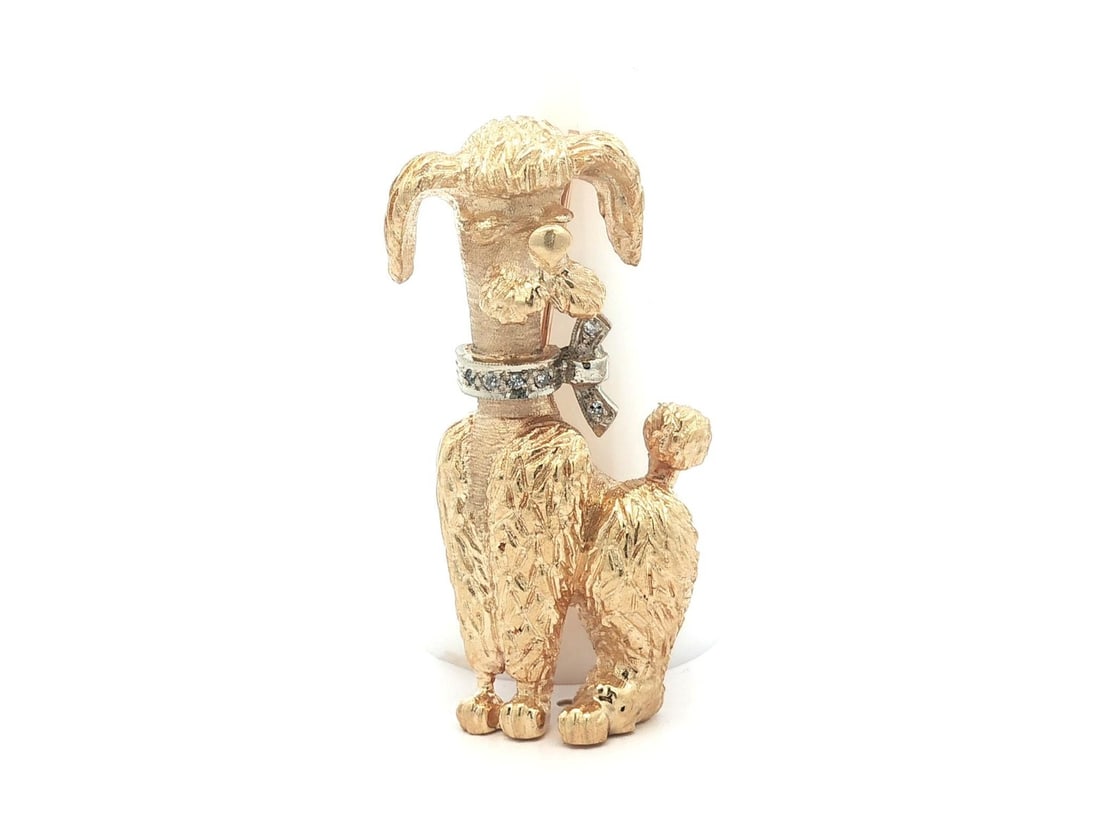 Vintage Two Tone Gold Diamond Poodle Dog Brooch Pin: Vintage Two Tone Gold Diamond Poodle Dog Brooch Pin This exquisite vintage brooch features a charming poodle dog design crafted from solid 13-14k yellow gold with white gold accents. Adorned with six 