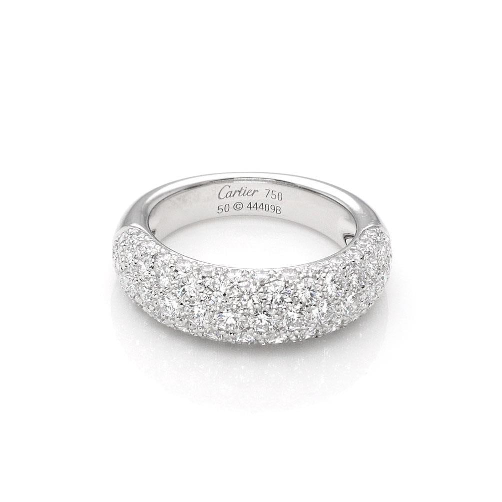 Cartier Etincelle Diamond 18k White Gold Band Ring with Box: Cartier Etincelle Diamond 18k White Gold Band Ring with Box This stunning Etincelle de Cartier band ring is a hallmark of luxury and craftsmanship. Made from 18k white gold, it showcases a high polish
