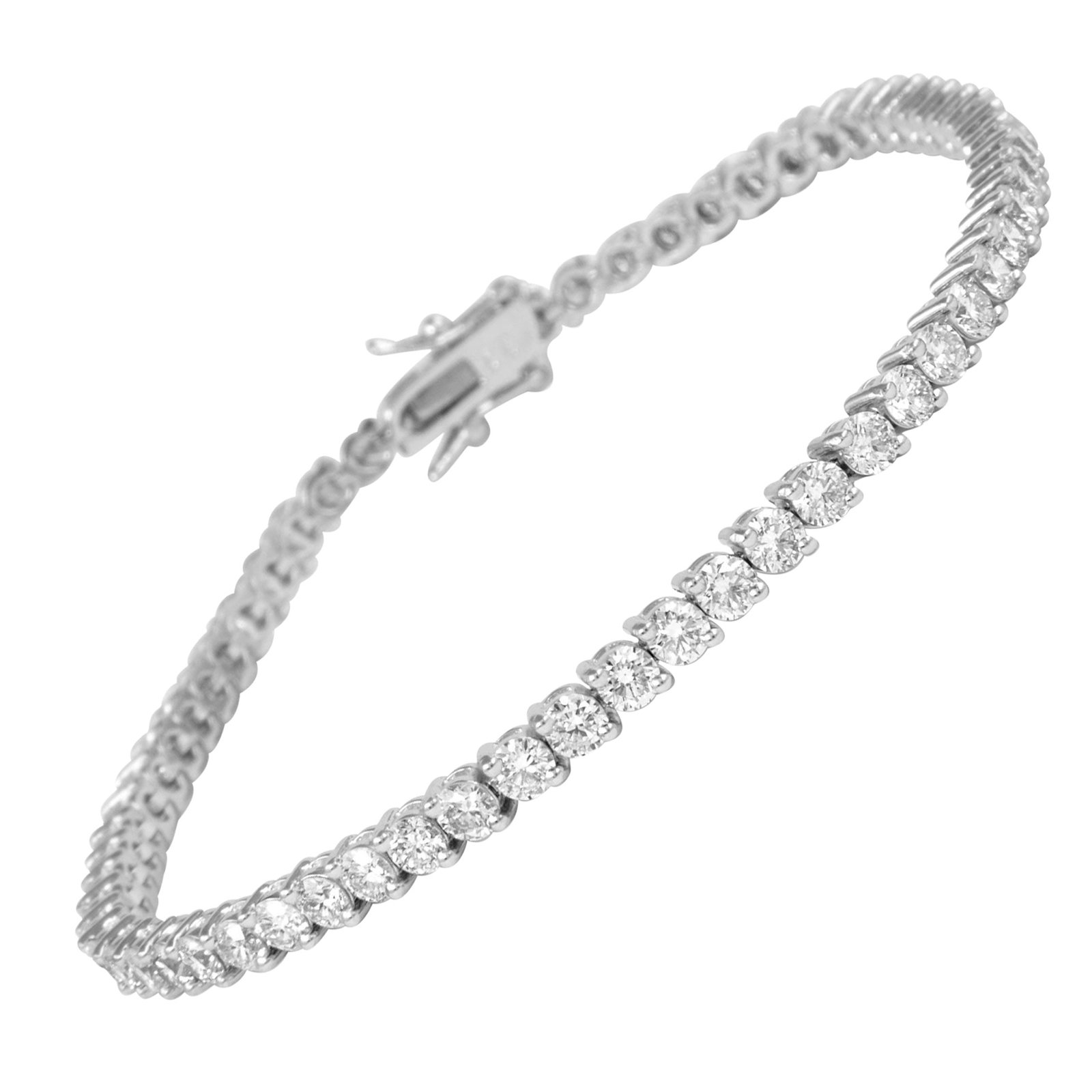 5.15ct D-F Diamond Tennis Bracelet 18k White Gold: 5.15ct D-F Diamond Tennis Bracelet 18k White Gold This exquisite 5.15ct diamond tennis bracelet is crafted from 18k white gold, showcasing a stunning array of 63 round brilliant diamonds. With a total