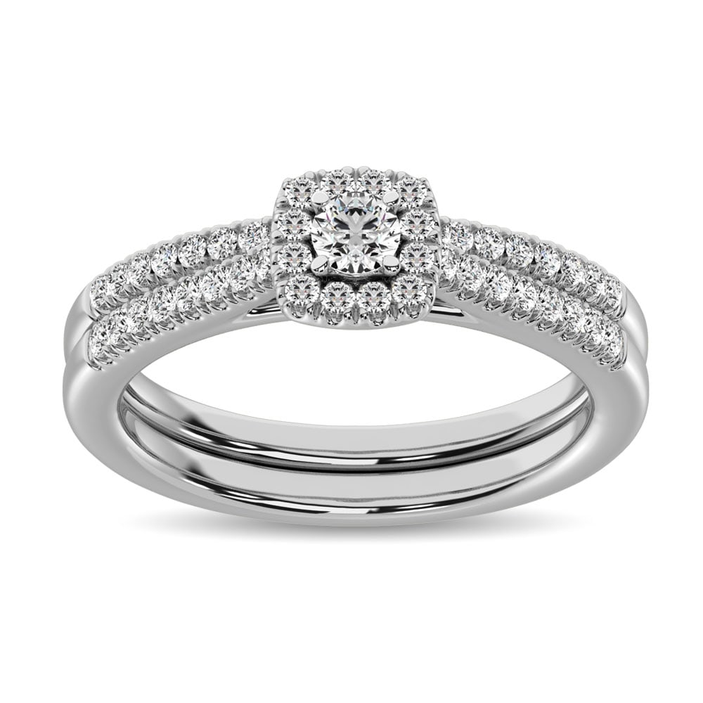 10K White Gold 2/5 Ct.tw Diamond Bridal Ring: 10K White Gold 2/5 Ct.tw Diamond Bridal Ring Celebrate your romance with this sweet diamond bridal ring. Crafted in cool 10K white gold, this feminine design features a shimmering round cut diamond wr