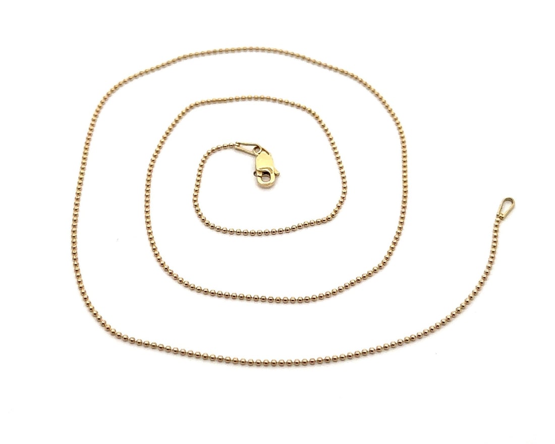 14k Yellow Gold 18 Inch Dainty Ball Bead Necklace with Lobster Clasp: 14k Yellow Gold 18 Inch Dainty Ball Bead Necklace with Lobster Clasp This elegant 14k yellow gold necklace features a dainty ball bead chain link design, perfect for adding a touch of sophistication t