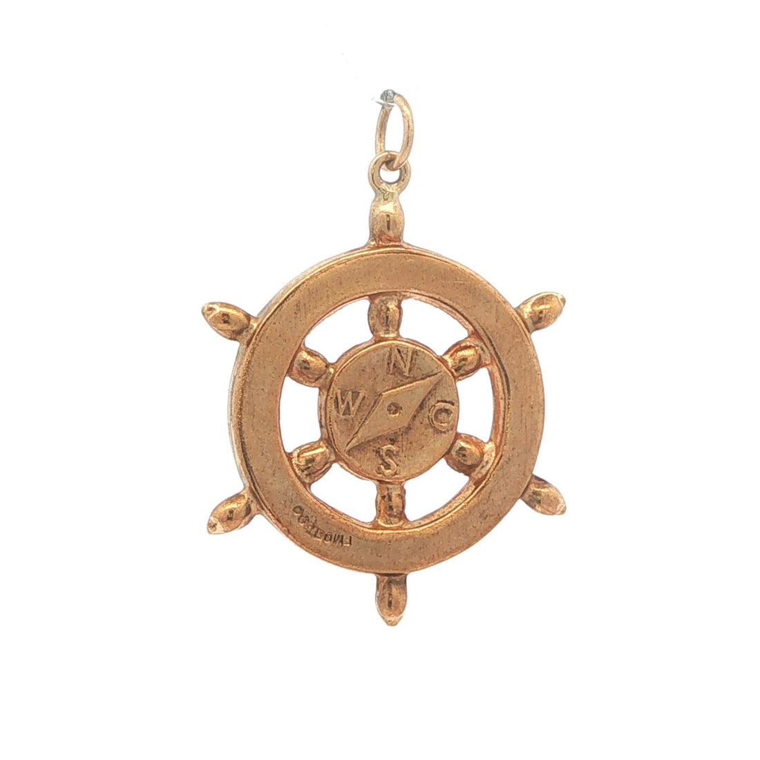 9k Yellow Gold Ship Wheel Compass Charm Pendant: 9k Yellow Gold Ship Wheel Compass Charm Pendant This vintage charm pendant features a collectible ship wheel compass design crafted from solid 9k yellow gold. With its detailed craftsmanship and prese