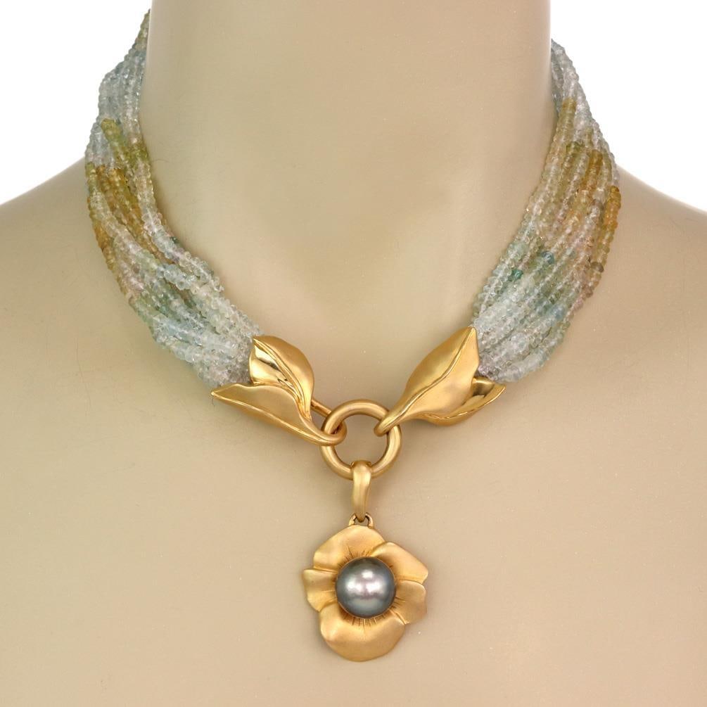 Estate 18k Gold Tahitian Pearl Aquamarine Flower Pendant Necklace: Estate 18k Gold Tahitian Pearl Aquamarine Flower Pendant Necklace This exquisite multi-strand beaded necklace features a stunning 13.5mm Tahitian pearl at the center of a beautifully designed flower p