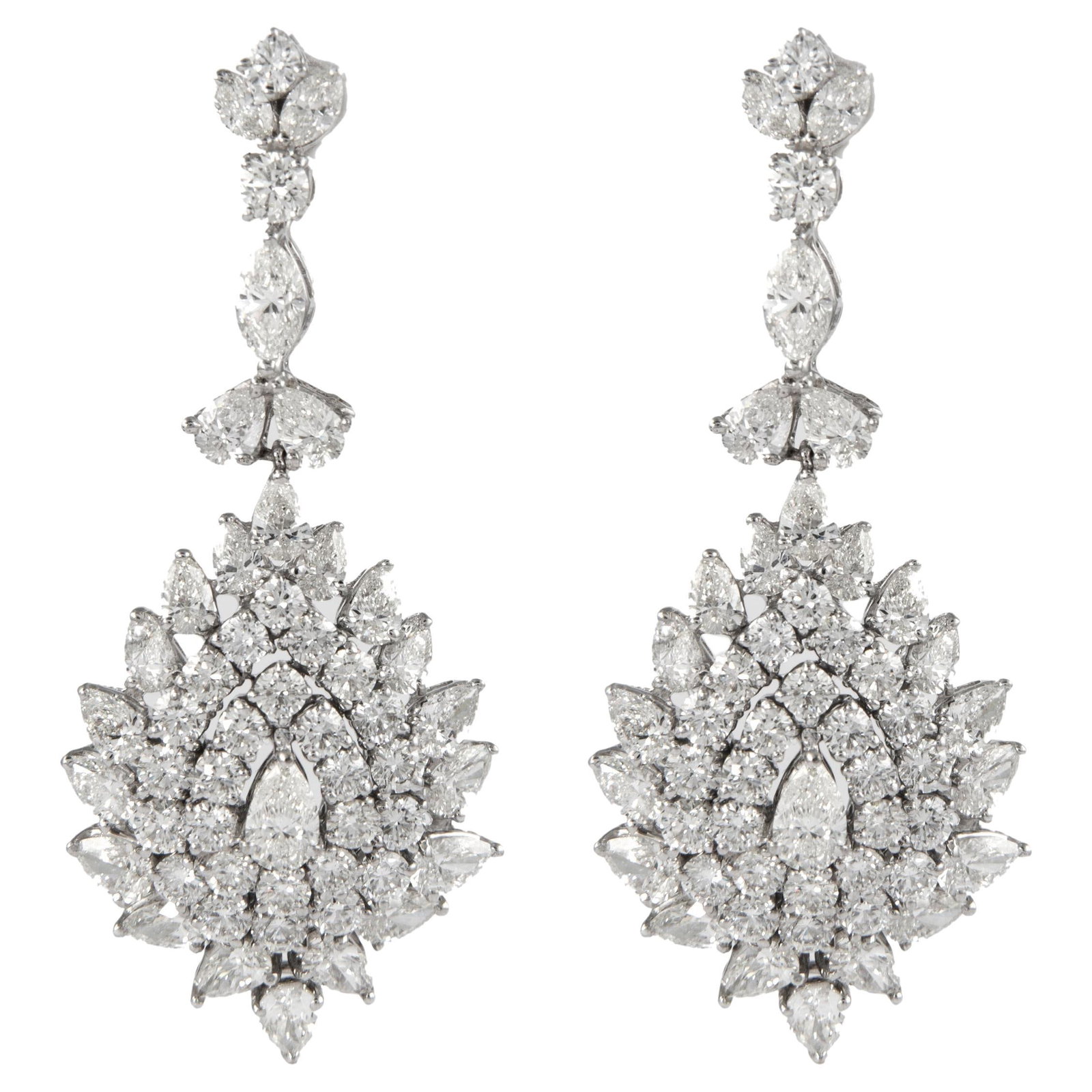 Vintage 15.75ct Diamond Chandelier Earrings in 18k White Gold: Vintage 15.75ct Diamond Chandelier Earrings in 18k White Gold These stunning vintage chandelier earrings feature approximately 15.75 carats of exquisite diamonds, including pear, marquise, and round b