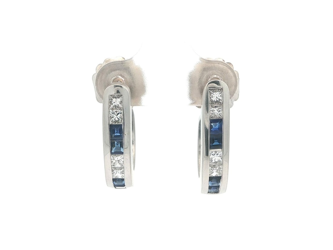 Square Blue Sapphire and Diamond Platinum Cuff Earrings with 14k White Gold Posts: Square Blue Sapphire and Diamond Platinum Cuff Earrings with 14k White Gold Posts These cuff-style earrings feature a sophisticated combination of solid platinum and 14k white gold posts and backs. Ea