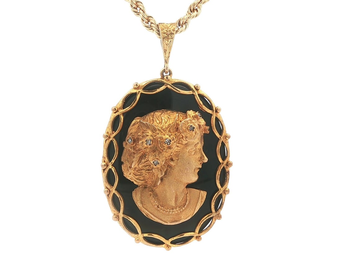 9K Yellow Gold Onyx Cameo Pendant Necklace Diamond Accents 29.5 in: 9K Yellow Gold Onyx Cameo Pendant Necklace Diamond Accents 29.5 in This vintage pendant necklace features a large, oval-cut natural black onyx cameo with a detailed lady face portrait. The pendant is 