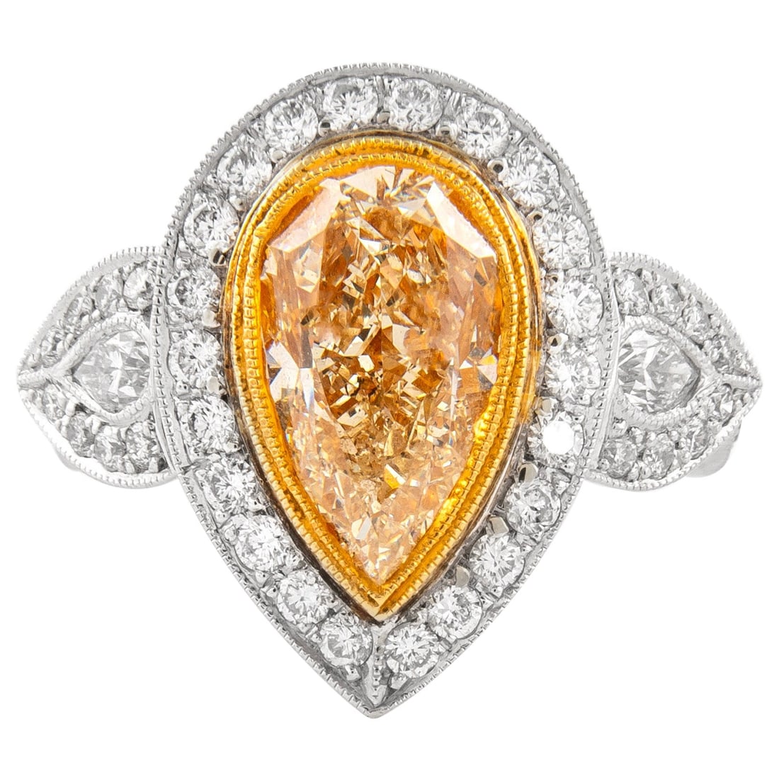 4.06ct Fancy Yellow Diamond Three-Stone Halo Ring in 18k Two-Tone Gold: 4.06ct Fancy Yellow Diamond Three-Stone Halo Ring in 18k Two-Tone Gold This exquisite three-stone halo ring features a stunning 4.06 carat fancy yellow pear-shaped diamond at its center, elegantly set