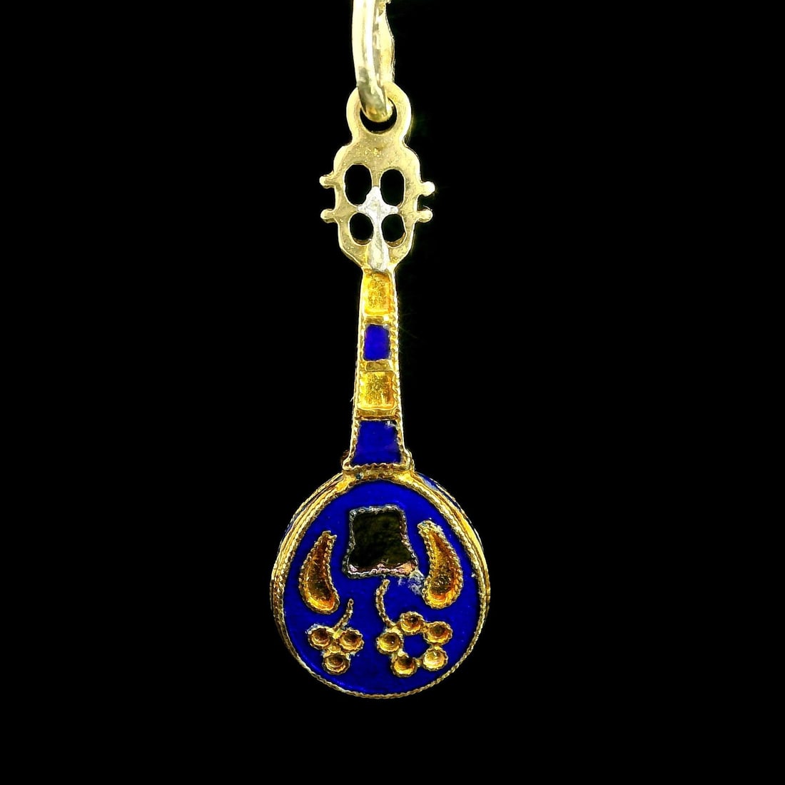 Yellow Gold Blue Enamel Oud Instrument Charm Pendant: Yellow Gold Blue Enamel Oud Instrument Charm Pendant This exquisite charm pendant showcases a detailed oud instrument design, beautifully crafted from 13-14k yellow gold and highlighted with cobalt bl