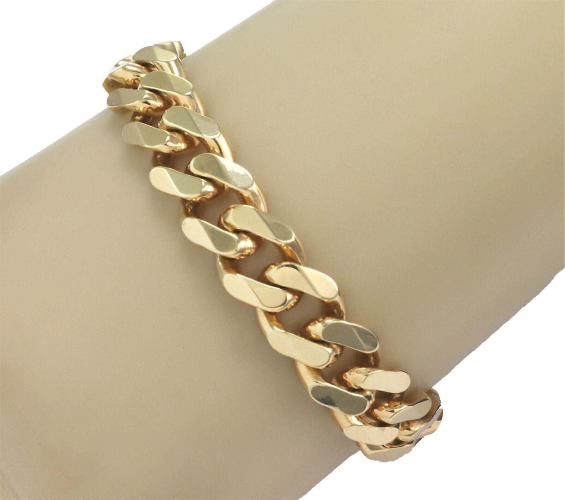 Midas 14k Yellow Gold Cuban Link Chain Bracelet 12mm: Midas 14k Yellow Gold Cuban Link Chain Bracelet 12mm A bold Cuban link bracelet crafted in 14k yellow gold with polished chain links and a classic, substantial profile. It is pre-owned and in great or