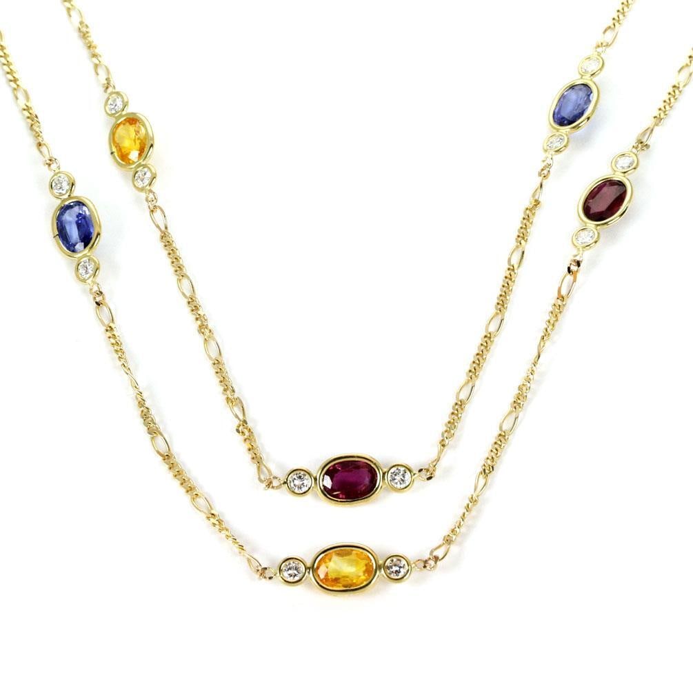 14k Yellow Gold Figaro Necklace with Diamonds and Gemstones 30: 14k Yellow Gold Figaro Necklace with Diamonds and Gemstones 30 This estate necklace features a 14k yellow gold Figaro link chain adorned with ten oval-cut multicolor gemstones, including citrine, garn