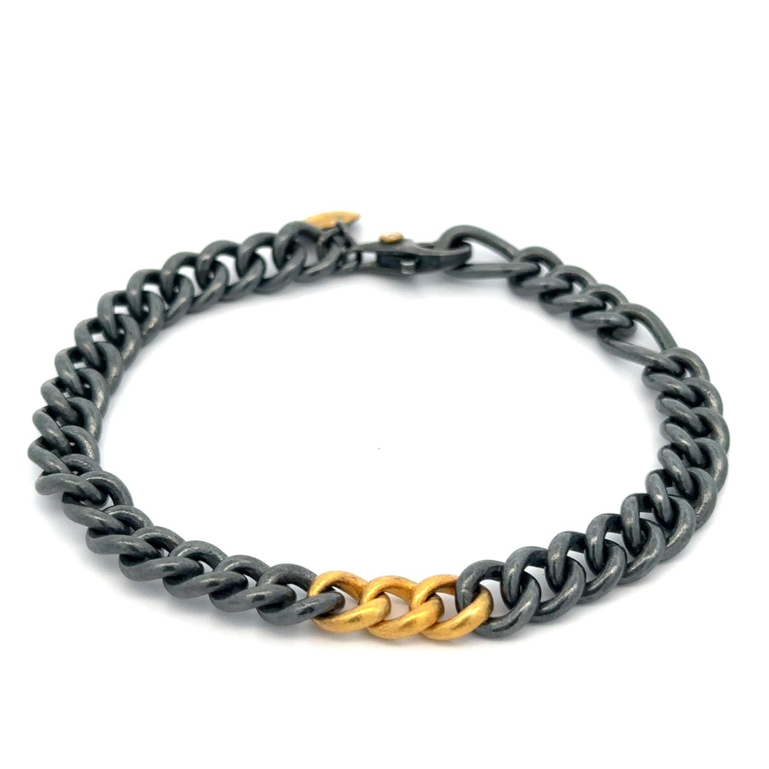 Carla Adjustable Curb Link Bracelet in 24k Gold and Blackened Silver: Carla Adjustable Curb Link Bracelet in 24k Gold and Blackened Silver This adjustable curb Cuban link bracelet features a solid blackened silver construction accented with 24k yellow gold. Designed for
