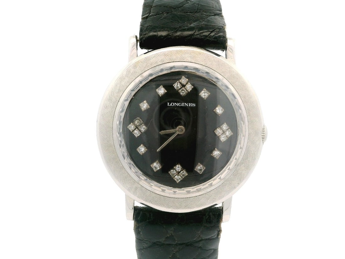 Vintage Longines 14k White Gold Mechanical Watch Ref 494M893 with Diamond Dial: Vintage Longines 14k White Gold Mechanical Watch Ref 494M893 with Diamond Dial This vintage Longines wristwatch features a stunning 14k white gold case and a luxurious black dial adorned with diamond 