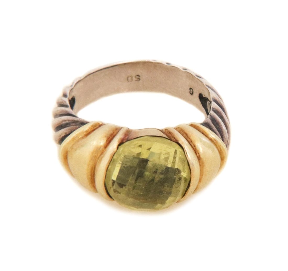 David Yurman Peridot Sterling Silver 14k Gold Accent Ring: David Yurman Peridot Sterling Silver 14k Gold Accent Ring This exquisite ring by David Yurman features a stunning 10mm faceted briolette peridot gemstone, embraced by elegant 14k yellow gold caps. Cra