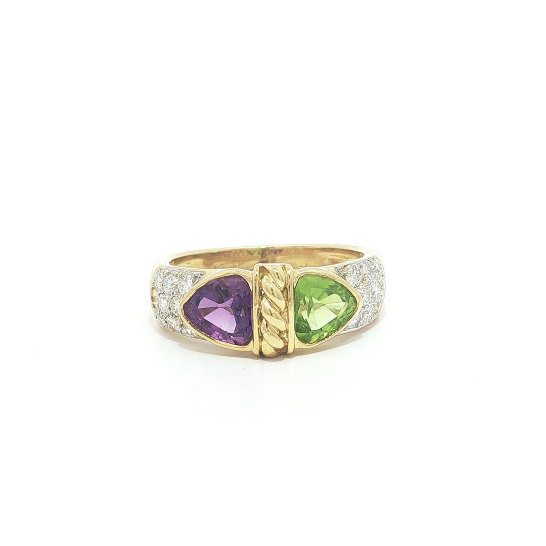 Trillion Amethyst and Peridot 18k Yellow Gold Band with Pave Diamonds: Trillion Amethyst and Peridot 18k Yellow Gold Band with Pave Diamonds This women's band ring features a striking design with bezel-set trillion-cut natural amethyst and peridot stones in vibrant purpl