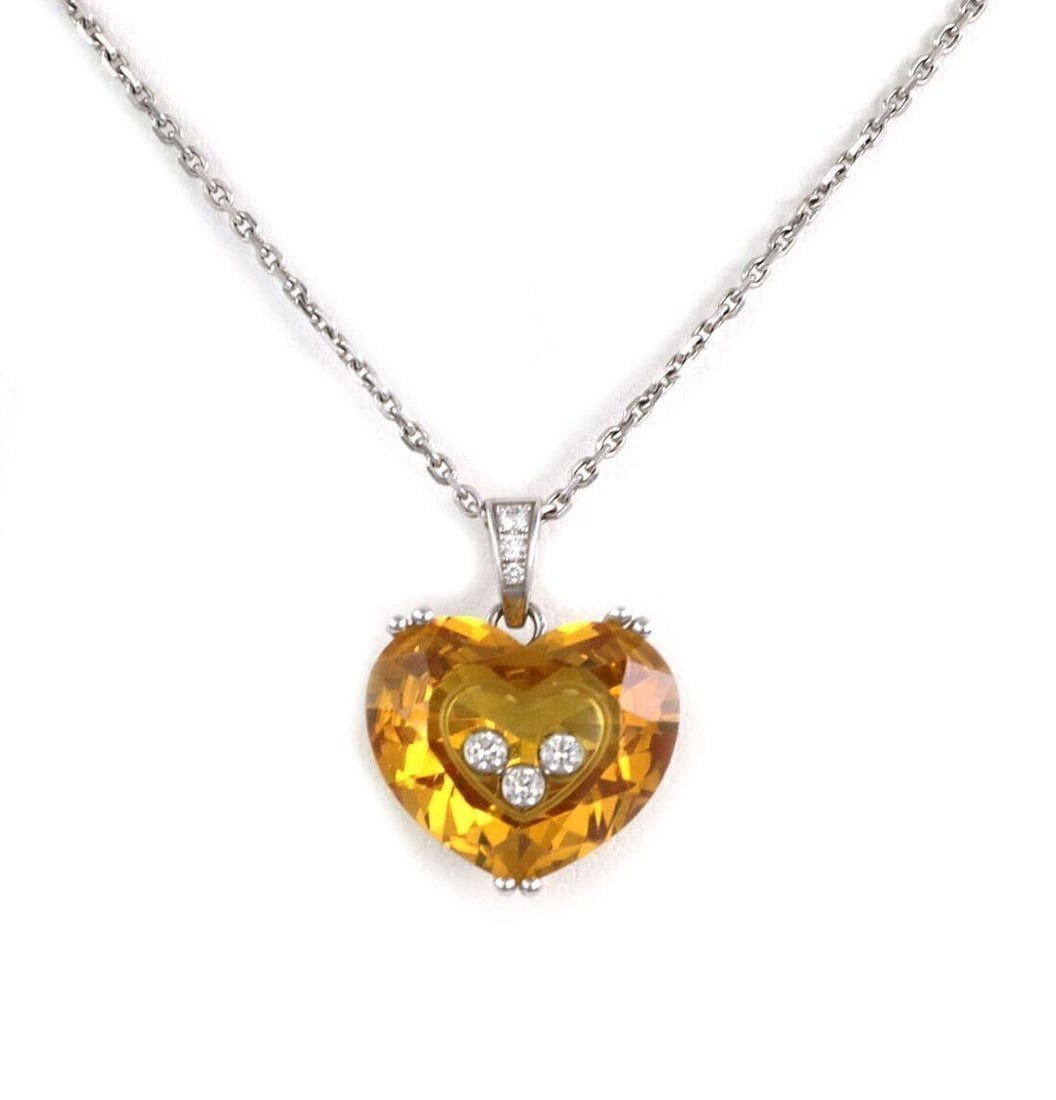 Chopard So Happy 18k White Gold Heart Pendant Necklace Yellow Crystal: Chopard So Happy 18k White Gold Heart Pendant Necklace Yellow Crystal This Chopard So Happy pendant necklace is crafted in 18k white gold and features a yellow crystal heart accented with natural diam