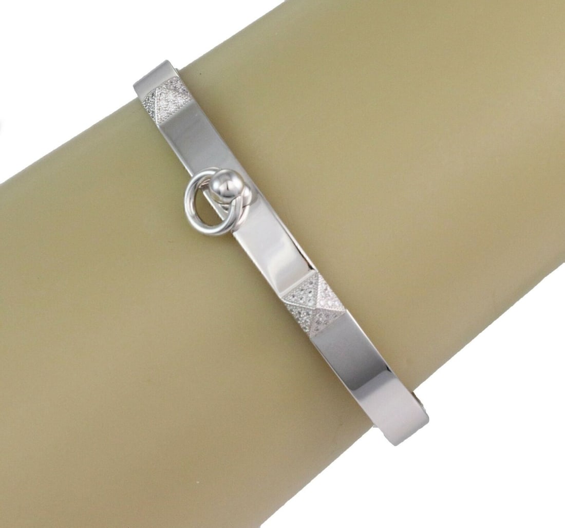 Hermes Collier de Chien 18k White Gold Diamond Bangle Bracelet: Hermes Collier de Chien 18k White Gold Diamond Bangle Bracelet An Hermes Collier de Chien diamond bangle bracelet crafted in 18k white gold with a pave setting and natural diamond accents totaling app