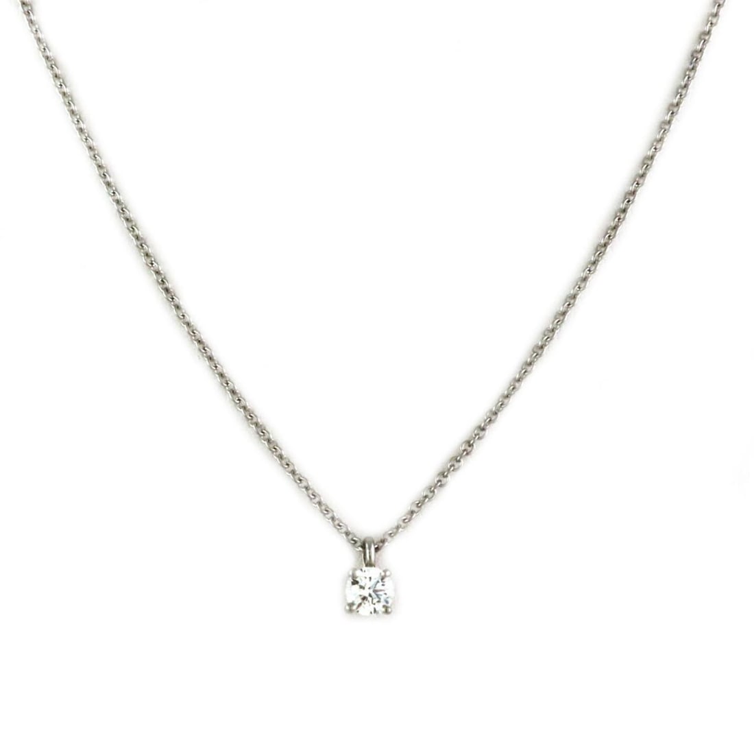 Tiffany & Co Platinum Solitaire Diamond Pendant Necklace: Tiffany & Co Platinum Solitaire Diamond Pendant Necklace Discover the timeless elegance of this Tiffany & Co. solitaire pendant necklace. Expertly crafted from platinum, this necklace features a stunn