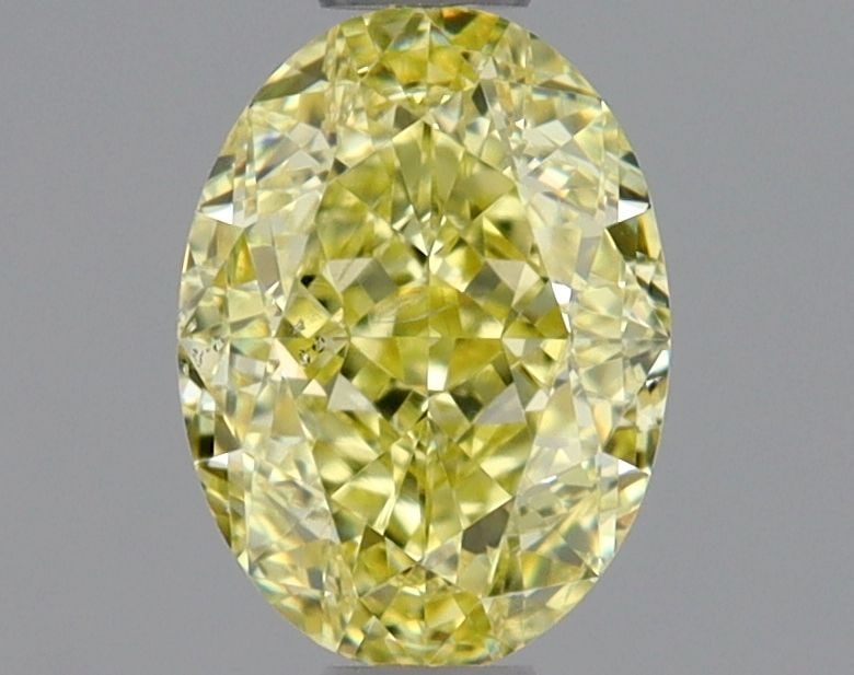 Loose Diamond - OVAL 0.9ct Fancy Yellow SI1: Loose Diamond - OVAL 0.9ct Fancy Yellow SI1 Source: Natural Shape: OVAL Carats: 0.9 Color: Fancy Yellow Certification: GIA Video: