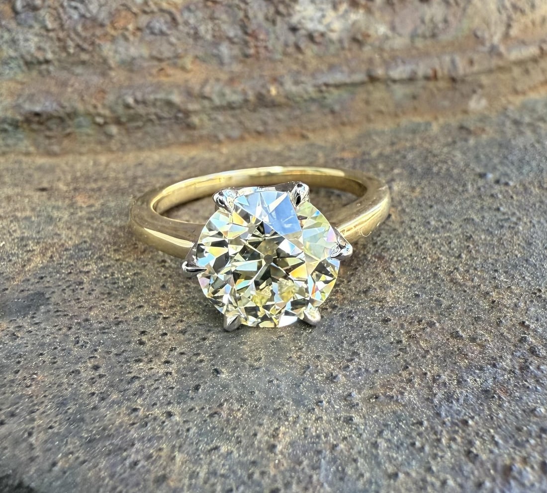 GIA 3.09ct Old European Diamond Ring 18k Yellow Gold Platinum Basket: GIA 3.09ct Old European Diamond Ring 18k Yellow Gold Platinum Basket This elegant engagement ring features a certified 3.09 carat Old European cut natural diamond, prong set in a solid 18k yellow gold
