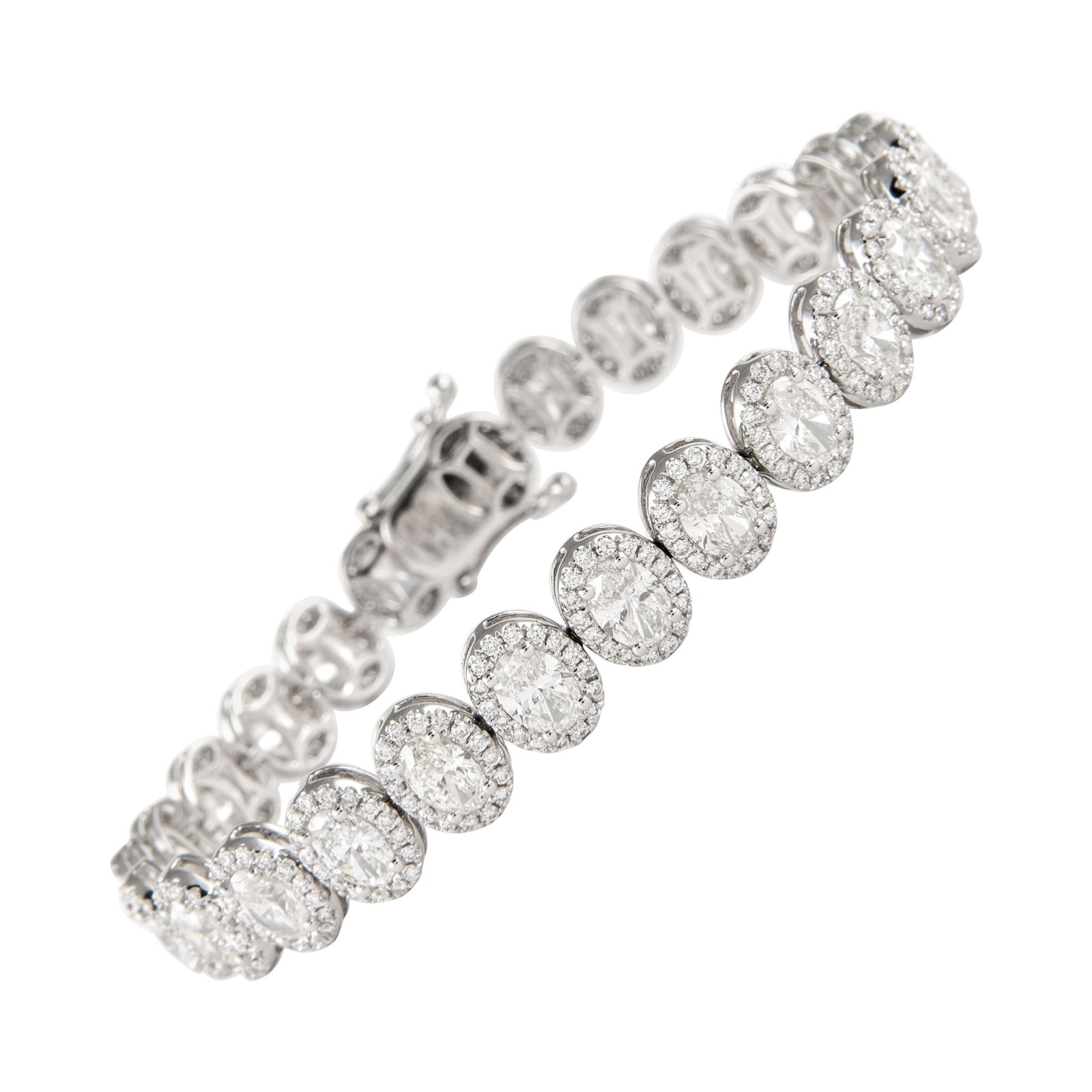 9.89ct Oval Diamond Tennis Bracelet 18k White Gold: 9.89ct Oval Diamond Tennis Bracelet 18k White Gold This exquisite tennis bracelet features a stunning arrangement of oval diamonds set in luxurious 18k white gold. With a total diamond weight of 9.89 