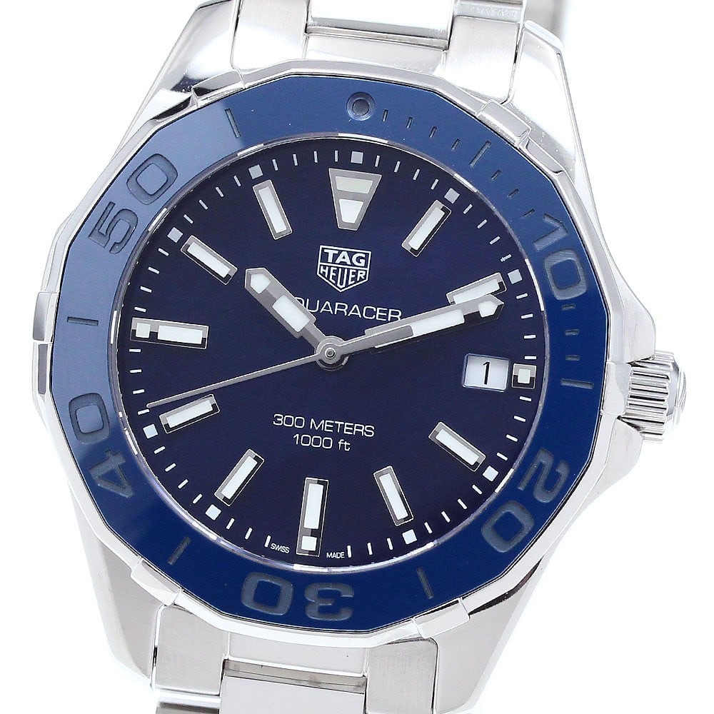 TAG Heuer Aquaracer WAY131S Blue Shell Quartz Ladies Watch: TAG Heuer Aquaracer WAY131S Blue Shell Quartz Ladies Watch This TAG Heuer Aquaracer Date Quartz wristwatch is designed for women and features a stainless steel case and bracelet. The blue shell dial i