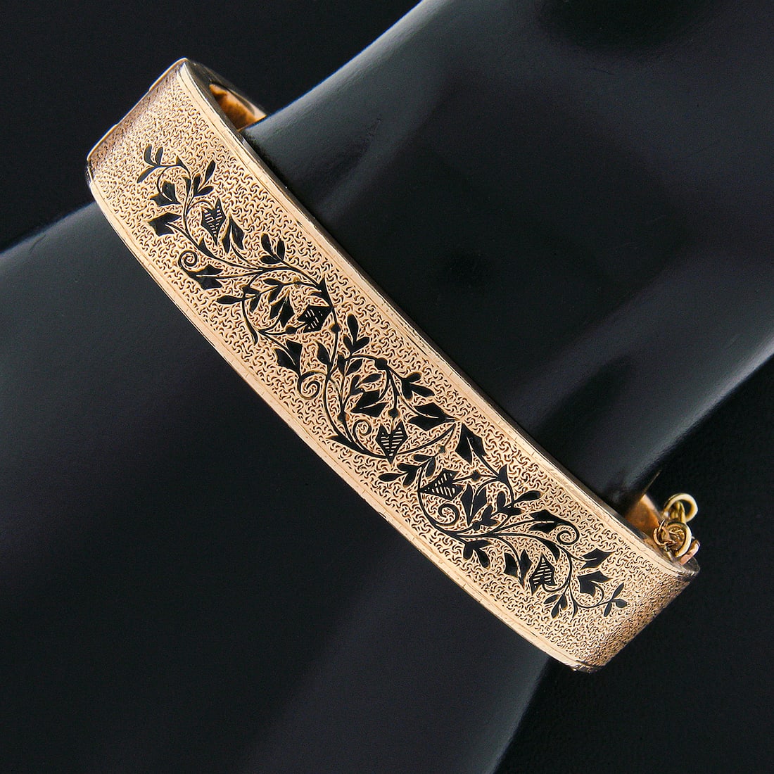Victorian 14k Gold Black Enamel Textured Mourning Bangle Bracelet: Victorian 14k Gold Black Enamel Textured Mourning Bangle Bracelet This exquisite Antique Victorian bangle bracelet is crafted from solid 14k rosy yellow gold and showcases stunning black enamel detail
