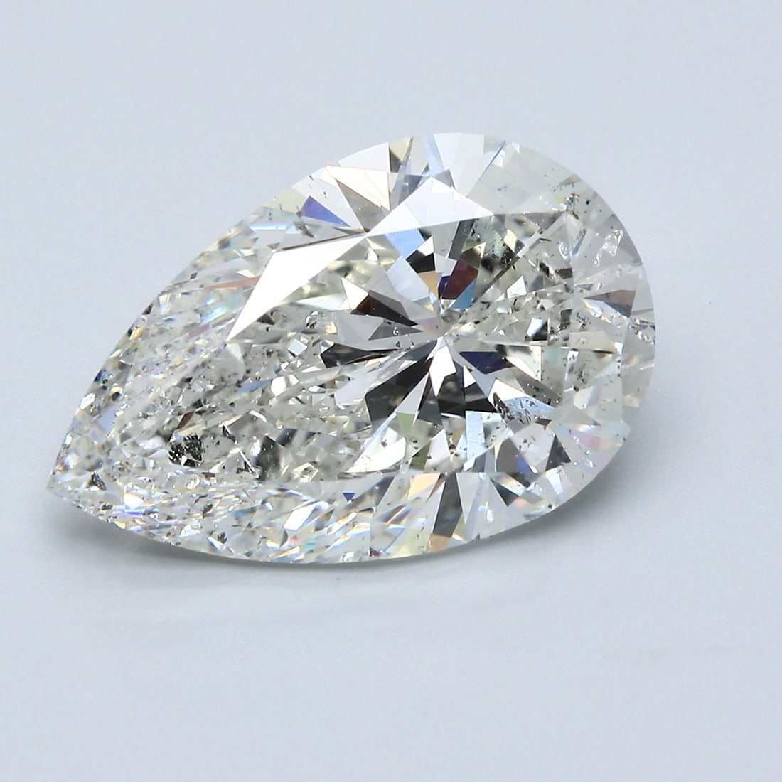 Loose Diamond - PEAR 7.08ct H SI2: Loose Diamond - PEAR 7.08ct H SI2 Source: Natural Mined Diamond Shape: PEAR Carats: 7.08 Color: H Clarity: SI2 Certification: GIA Condition: Pre-Owned PLEASE NOTE: Framed, Large, or heavy items do not