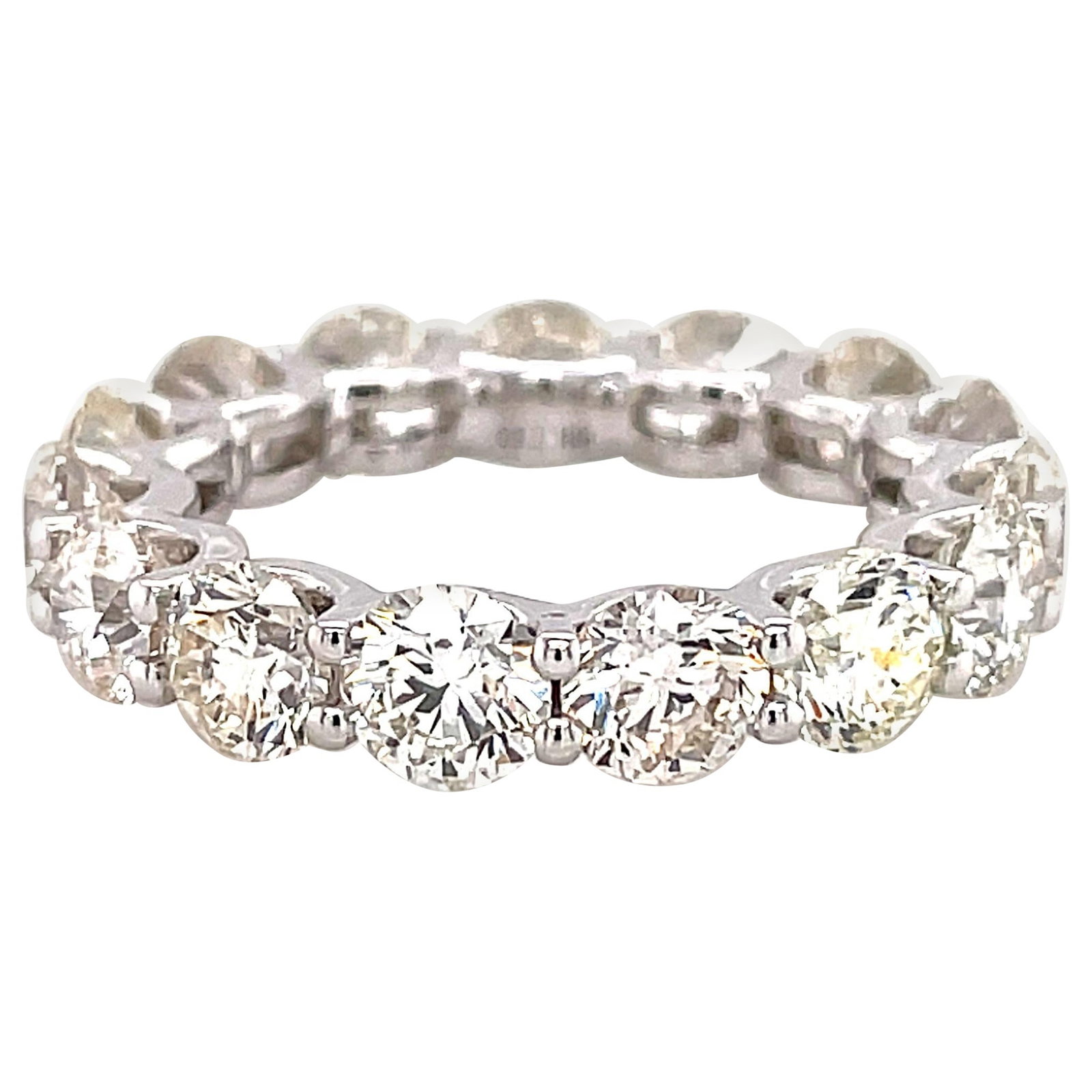 5.68ct Round Diamond Eternity Band 18k White Gold: 5.68ct Round Diamond Eternity Band 18k White Gold This exquisite 5.68ct Round Diamond Eternity Band is crafted from 18k White Gold and showcases a total of 15 round brilliant diamonds. With an approxi