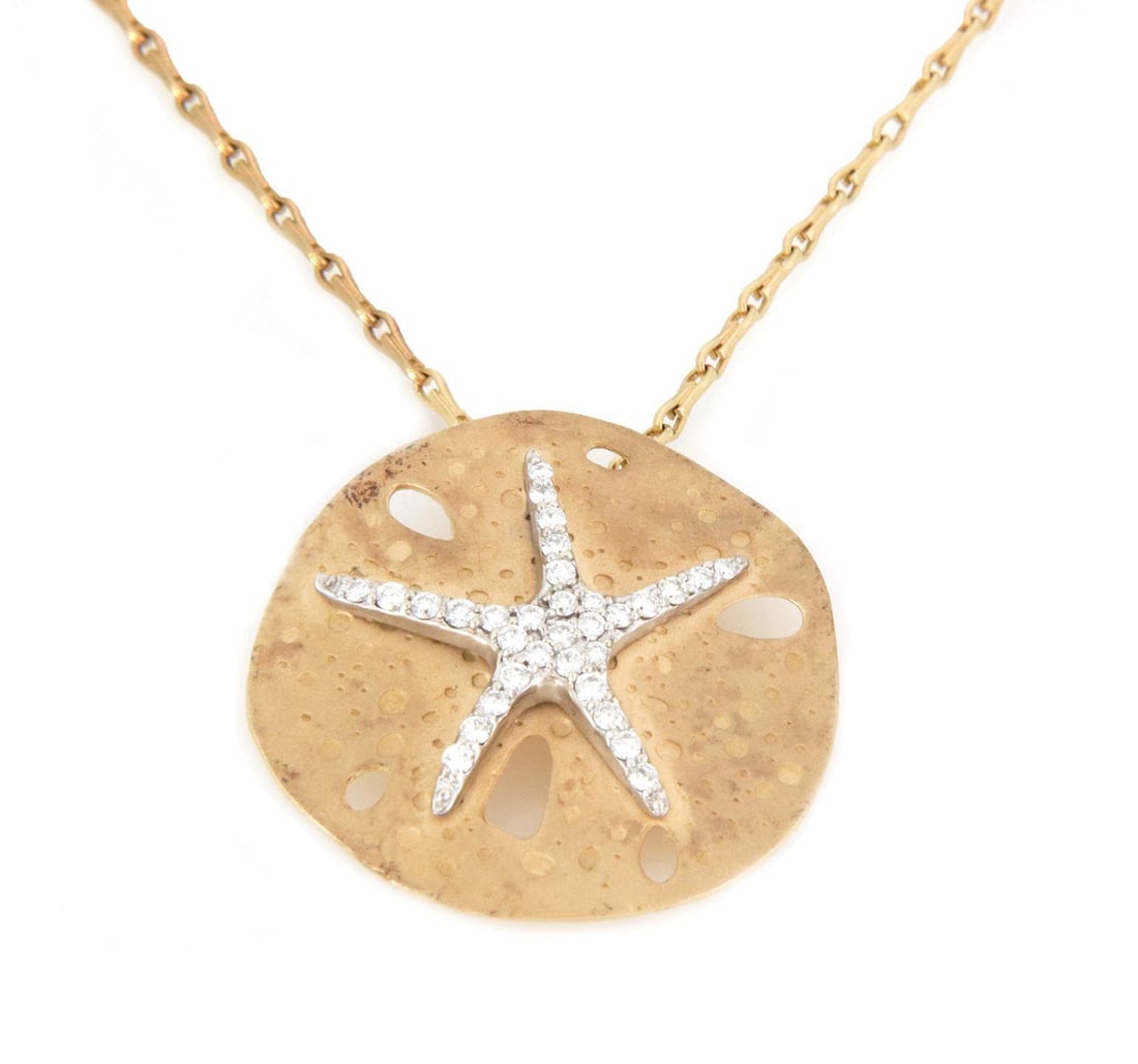 14k Yellow White Gold Starfish Shell Disc Pendant Necklace: 14k Yellow White Gold Starfish Shell Disc Pendant Necklace This exquisite pendant and chain are crafted from 14k yellow and white gold, featuring a large, thin shell disc with a textured under-the-sea