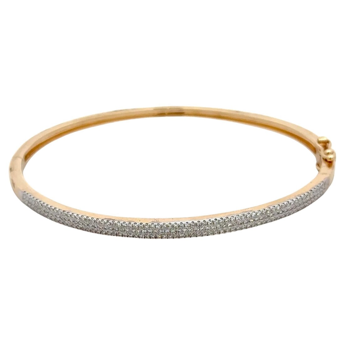 14K Yellow Gold Three Row Diamond Pave Bangle Bracelet 0.55 CTW: 14K Yellow Gold Three Row Diamond Pave Bangle Bracelet 0.55 CTW This stunning three-row pave diamond bangle bracelet is crafted in 14K yellow and white gold. Featuring a total of 0.55 carats of round 