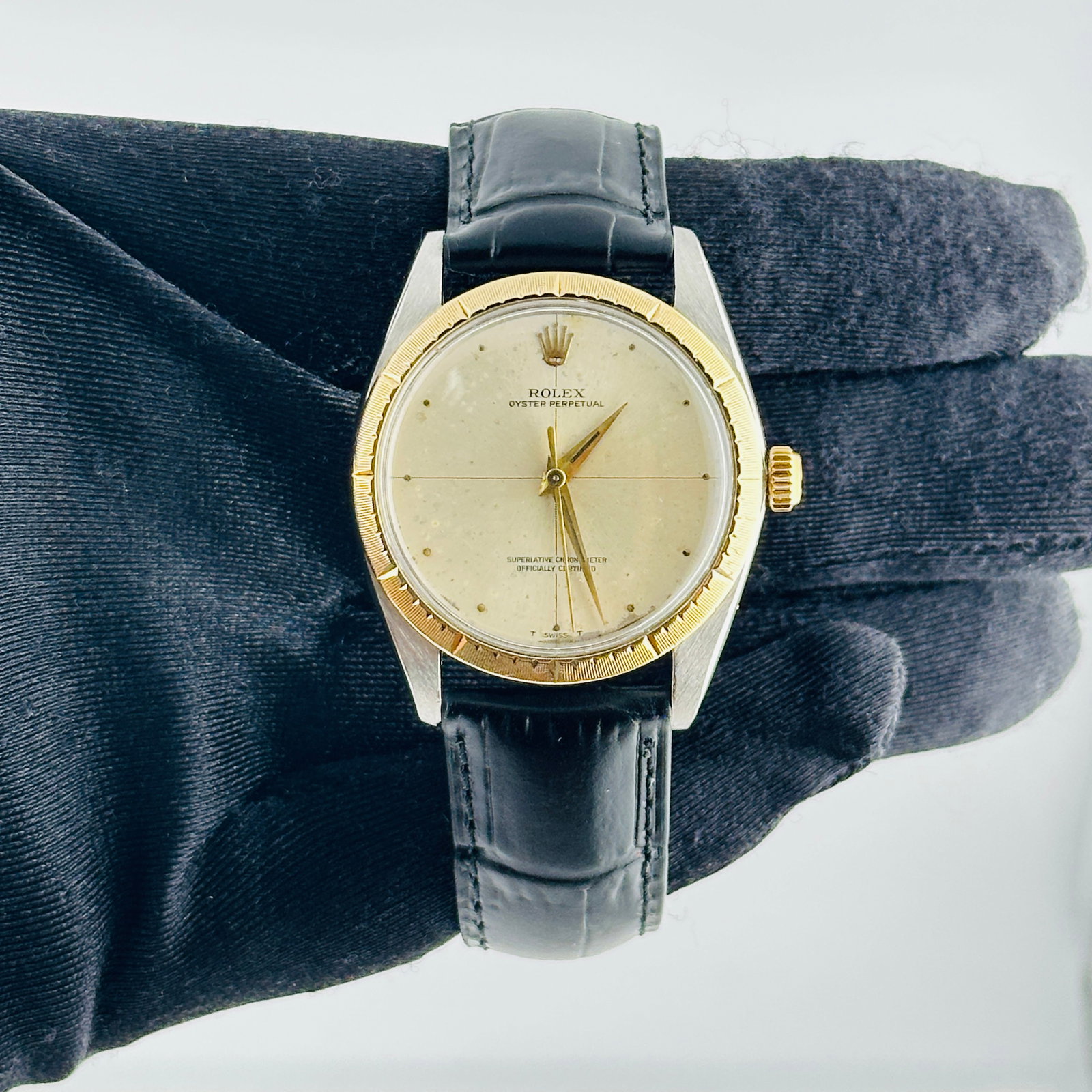 Rolex Oyster Perpetual Ref 1008 Zephyr silver dial generic leather strap: Rolex Oyster Perpetual Ref 1008 Zephyr silver dial generic leather strap Rolex Oyster Perpetual wristwatch, reference 1008, with a Silver Zephyr dial that has spots. It features an engine turned 14k y