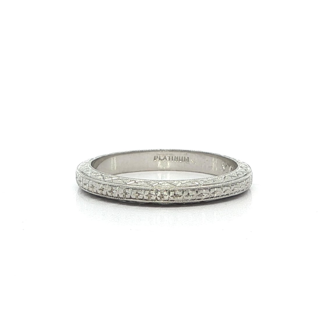 Antique Art Deco Platinum Engraved Band Ring Size 4: Antique Art Deco Platinum Engraved Band Ring Size 4 This exquisite Antique Art Deco band ring is crafted from solid platinum, showcasing intricate engravings that highlight its exceptional craftsmansh