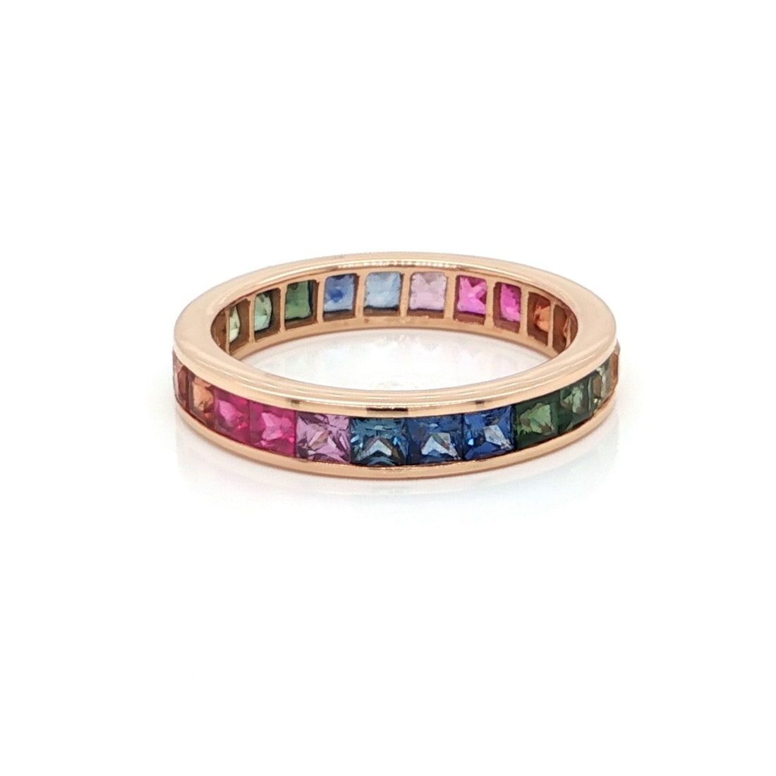 Unbranded Rainbow Sapphire Eternity Band Ring 18k Rose Gold Size 6.5: Unbranded Rainbow Sapphire Eternity Band Ring 18k Rose Gold Size 6.5 A pre-owned full eternity band ring crafted in 18k rose gold and set with multicolor princess-cut sapphires. The ring has a smooth,