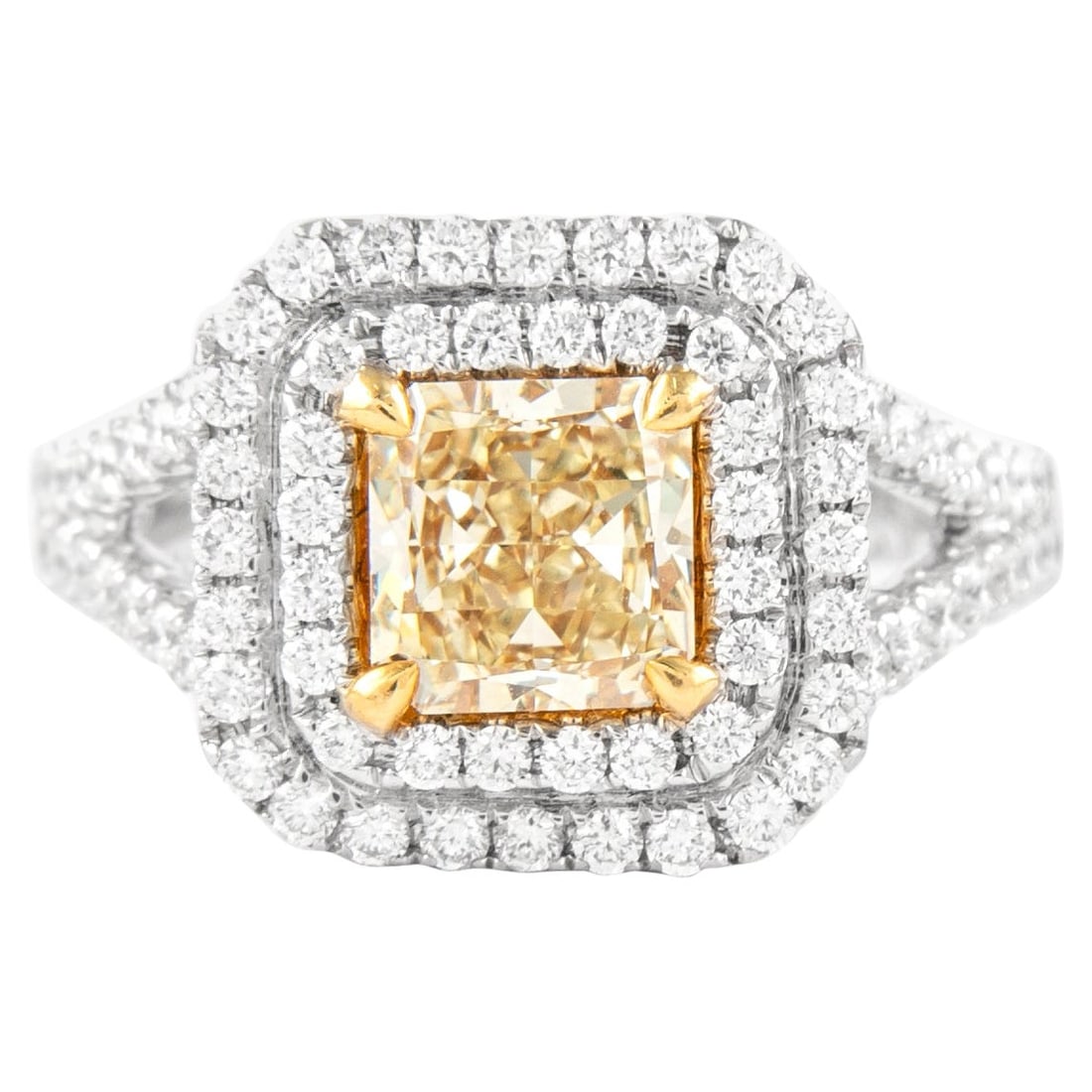 2.33ct Fancy Yellow VVS2 Diamond Halo Ring 18k Gold EGL Certified: 2.33ct Fancy Yellow VVS2 Diamond Halo Ring 18k Gold EGL Certified This exquisite 2.33ctt Fancy Yellow VVS2 Diamond Double Halo Ring is crafted in a stunning two-tone design of 18k yellow and white gol