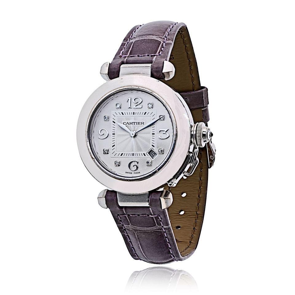 Pasha 32mm 18K White Gold Watch with Diamond Hour Markers by Cartier: Pasha 32mm 18K White Gold Watch with Diamond Hour Markers by Cartier This Cartier Pasha wristwatch features an 18K white gold case measuring 32mm in diameter. The refined dial is adorned with diamond 