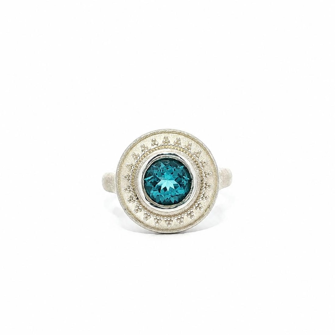 Sterling Silver Cocktail Ring with Swiss Blue Topaz Round Bezel Size 6.5: Sterling Silver Cocktail Ring with Swiss Blue Topaz Round Bezel Size 6.5 Cocktail ring featuring a natural genuine vivid blue Swiss blue topaz in a round brilliant cut. The stone is bezel set in solid