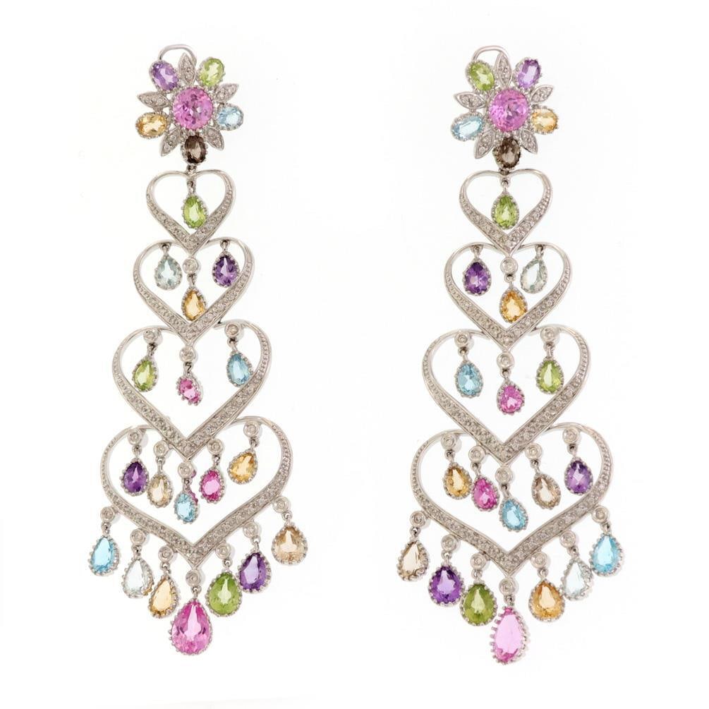 14k White Gold Chandelier Earrings with Multicolor Sapphires and Diamonds: 14k White Gold Chandelier Earrings with Multicolor Sapphires and Diamonds Elevate your elegance with these breathtaking chandelier earrings, meticulously crafted from 14k white gold. The design featur