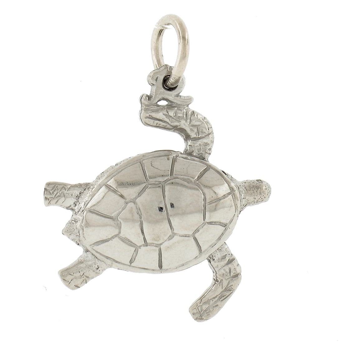 Unbranded 14K White Gold Turtle Charm Pendant with Bail: Unbranded 14K White Gold Turtle Charm Pendant with Bail Solid 14K white gold turtle charm pendant with a polished finish and detailed design. This pre-owned pendant includes a bail and has no main sto
