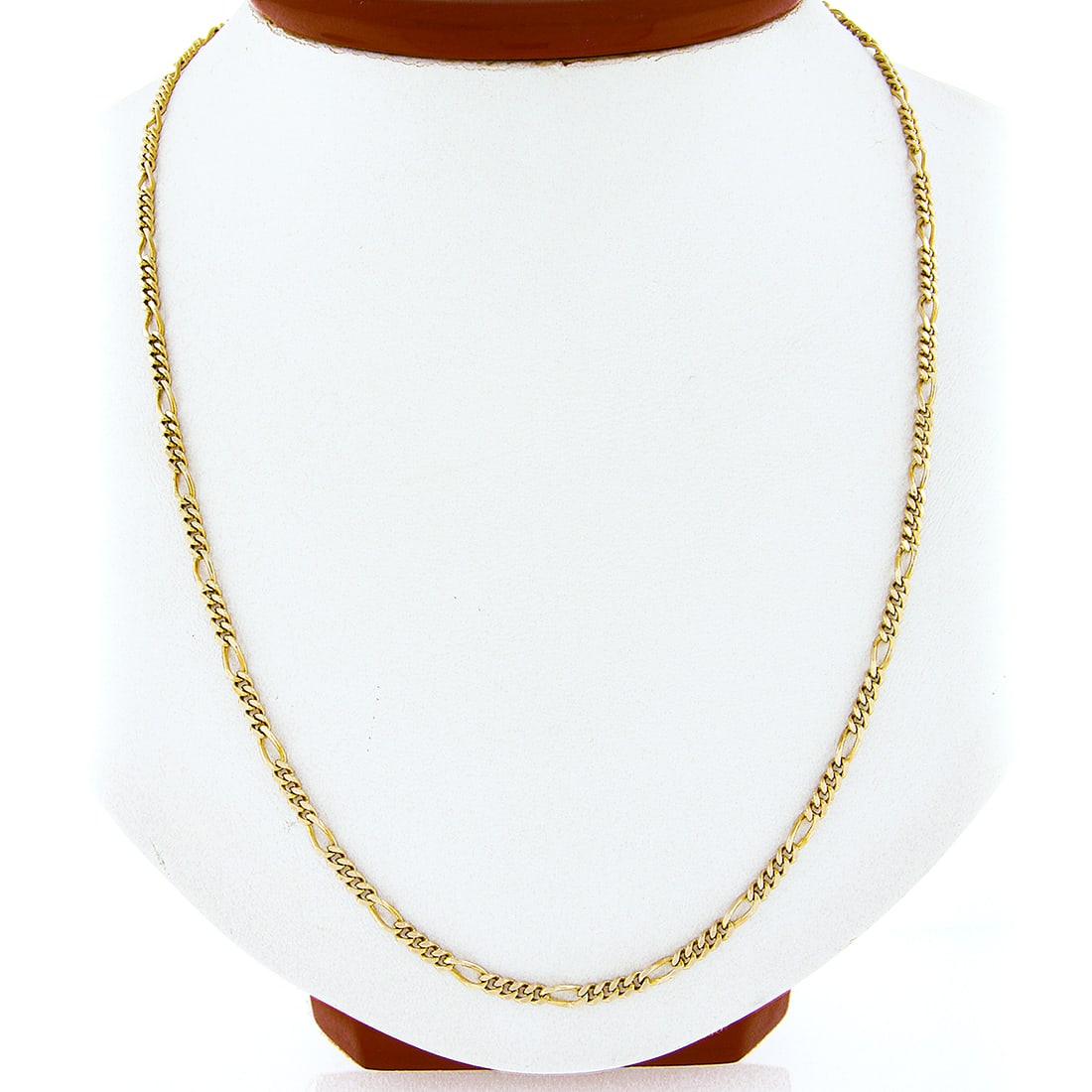Solid 14K Yellow Gold 20 Inch Figaro Link Chain Necklace: Solid 14K Yellow Gold 20 Inch Figaro Link Chain Necklace This exquisite unisex Figaro link chain necklace is crafted in Italy from solid 14K yellow gold, showcasing a luxurious high-polished finish. M