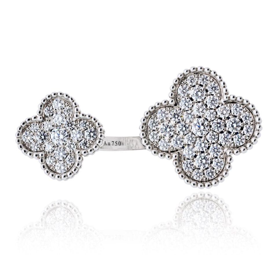 Alhambra Magic Between the Fingers Ring 18K White Gold Diamond by Van Cleef & Arpels: Alhambra Magic Between the Fingers Ring 18K White Gold Diamond by Van Cleef & Arpels This Van Cleef & Arpels Magic Alhambra Between the Fingers ring is crafted in 18K white gold and features the Maiso