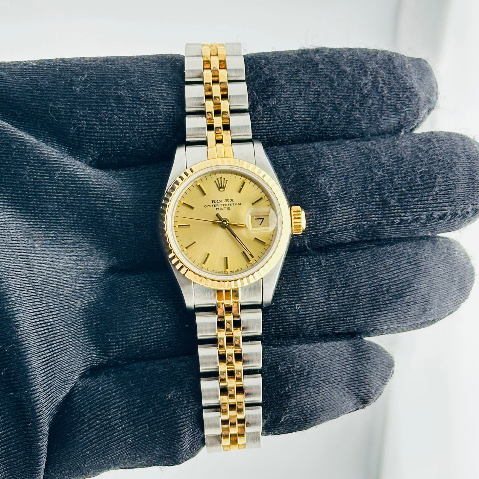 Rolex 69173 Datejust Lady Watch Champagne Dial Jubilee Bracelet: Rolex 69173 Datejust Lady Watch Champagne Dial Jubilee Bracelet Ladies Rolex Datejust Lady watch, reference 69173, featuring a champagne stick dial, fluted bezel, and D-Link Jubilee bracelet. The seri