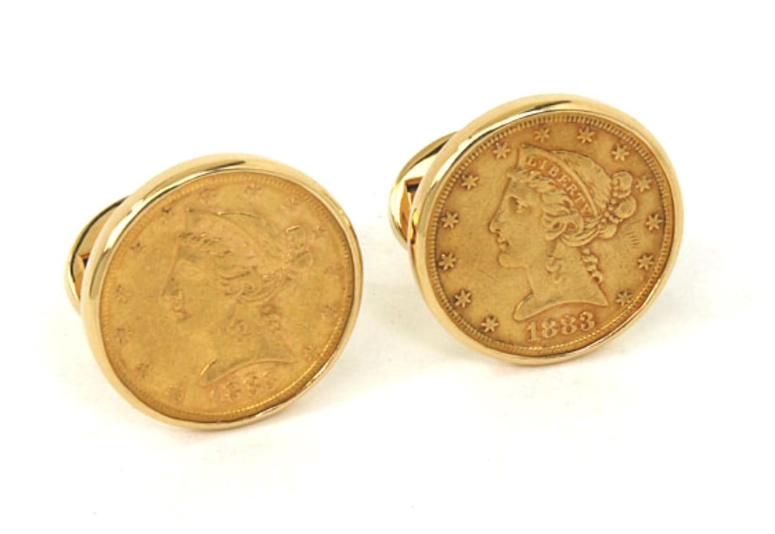 Men's Vintage Cufflinks 1883 22k Coin in 14k Yellow Gold Pair: Men's Vintage Cufflinks 1883 22k Coin in 14k Yellow Gold Pair Vintage estate cufflinks featuring genuine 1883 gold coins set in 14k yellow gold frames. The pair is described as pre-owned and in great 