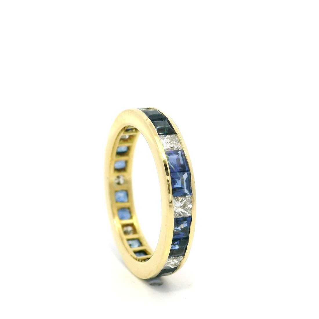 18k Yellow Gold GIA Certified No Heat Blue Sapphire Diamond Eternity Band Ring: 18k Yellow Gold GIA Certified No Heat Blue Sapphire Diamond Eternity Band Ring This exquisite 18k yellow gold eternity band ring features a stunning array of natural gemstones. The ring showcases 27 v
