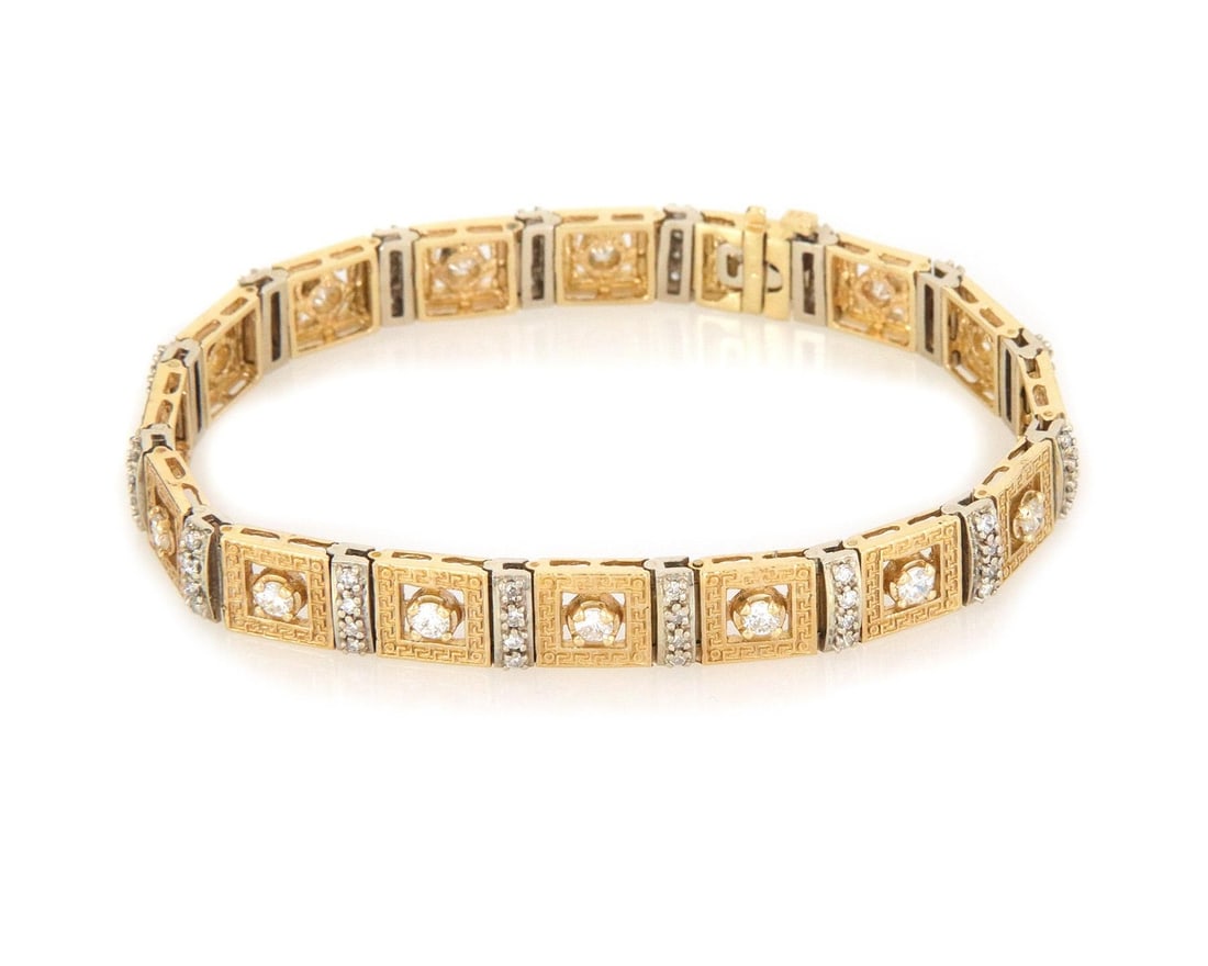 14k Gold Open Style Bracelet with Diamonds and Square Links: 14k Gold Open Style Bracelet with Diamonds and Square Links This stunning bracelet features a unique open style design, elegantly crafted from 14k yellow and white gold. It showcases 14 yellow gold sq