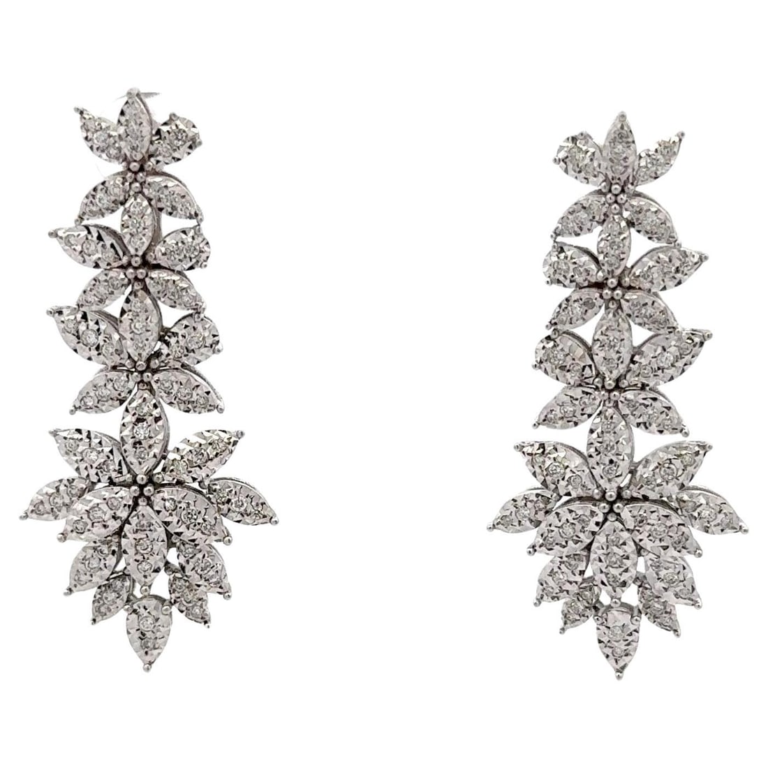 Harbor Diamonds 14K White Gold Floral Drop Cluster Earrings 0.86ct F-G VS1-VS2: Harbor Diamonds 14K White Gold Floral Drop Cluster Earrings 0.86ct F-G VS1-VS2 These exquisite Floral Drop Cluster Earrings feature a stunning design crafted from 14 karat white gold. Adorned with 166
